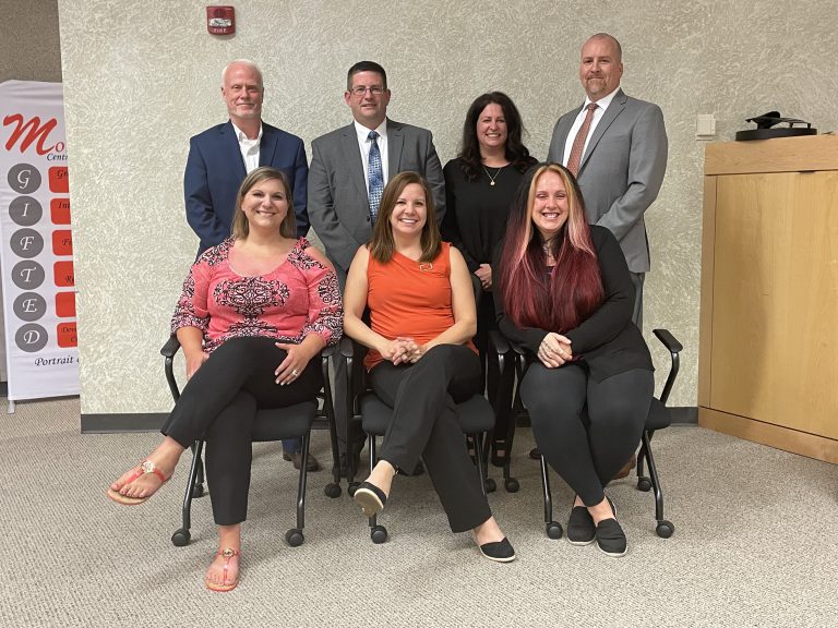 Board of education members gathered for a photo