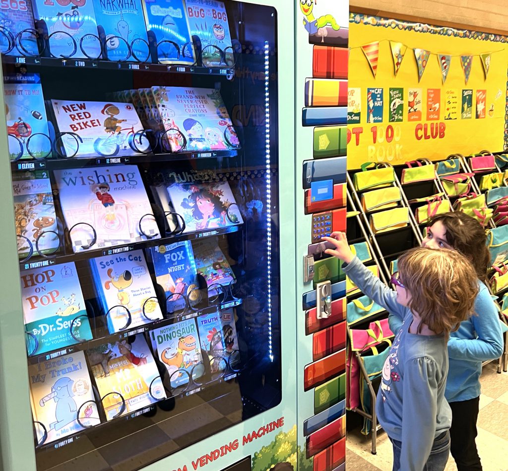 Students using the book vending machine