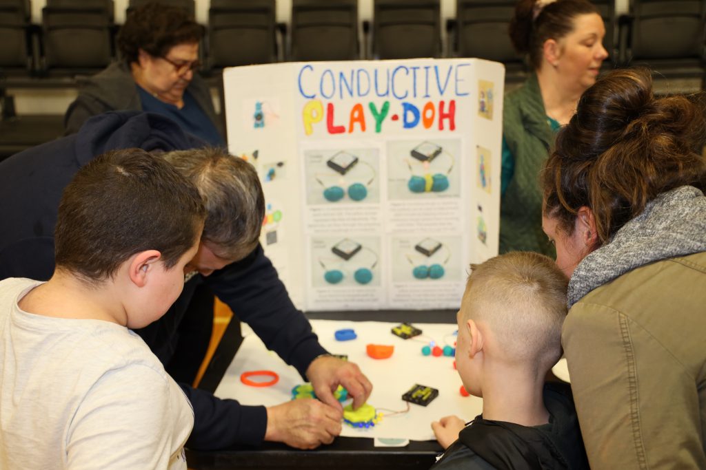 Students at a science fair 