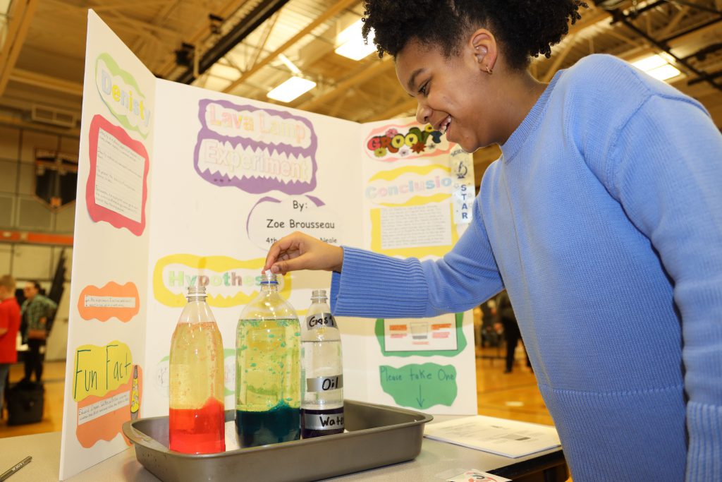 Students at a science fair 