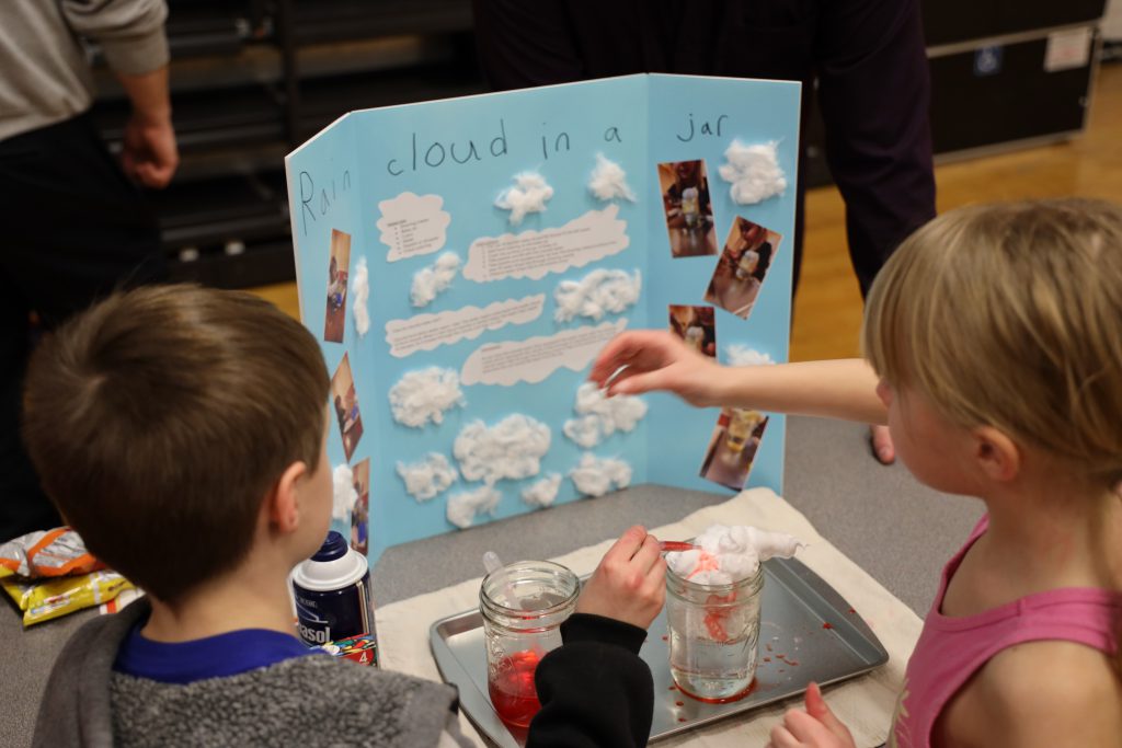 Students at a science fair 